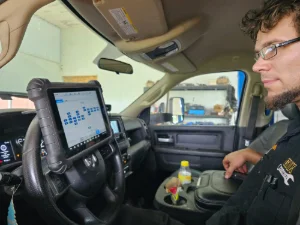 A Mechanic from GMK Mechanical performing engine diagnostics in Lititz, PA