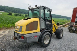 A yellow tractor at the GMK Mechanical facilities in York, PA